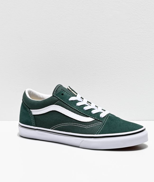 dark green vans slip on
